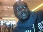 Muyideen a man of 38 years old living in Angleterre looking for a young woman